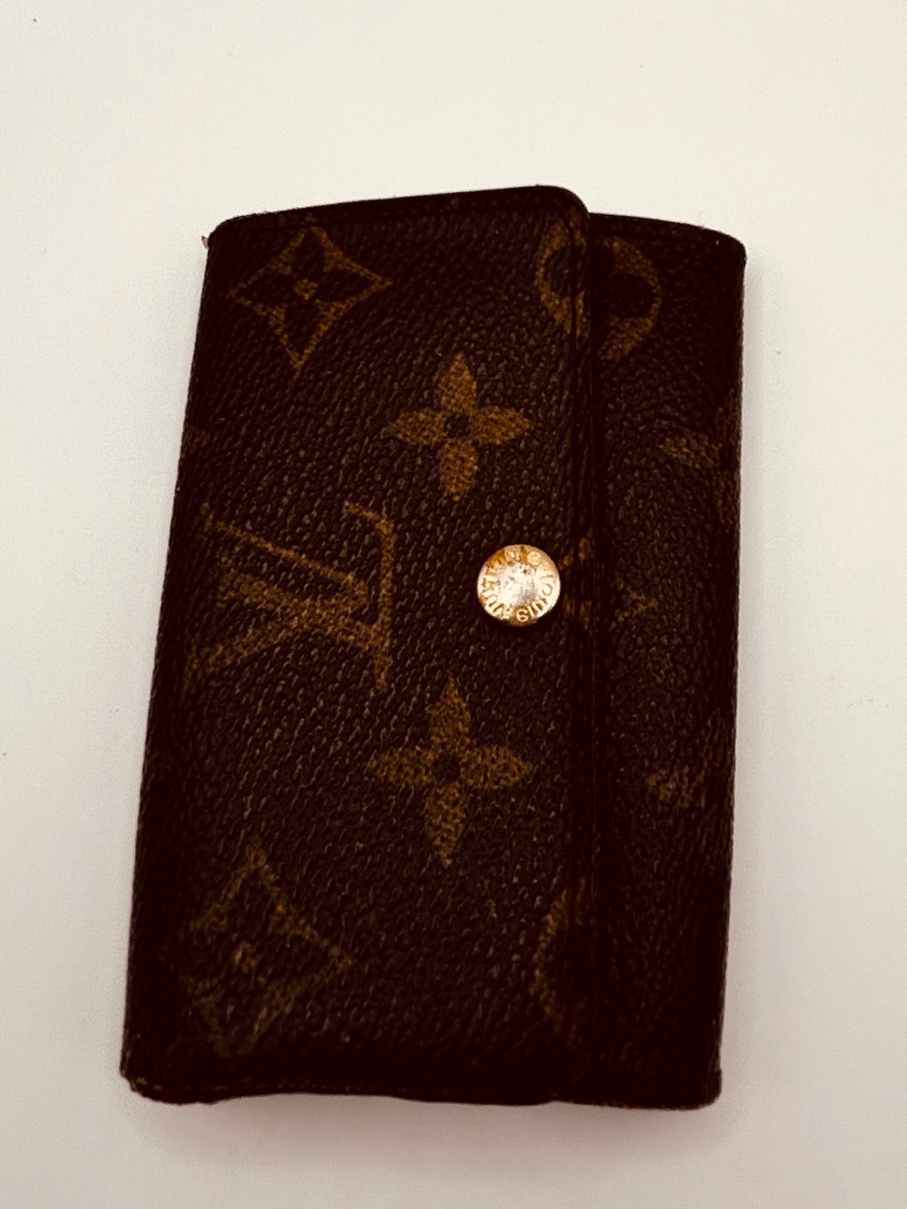 Louis Vuitton Monogram Key Pouch in Dark Brown with Gold Snap good condition